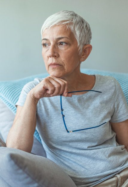 elderly woman pondering life